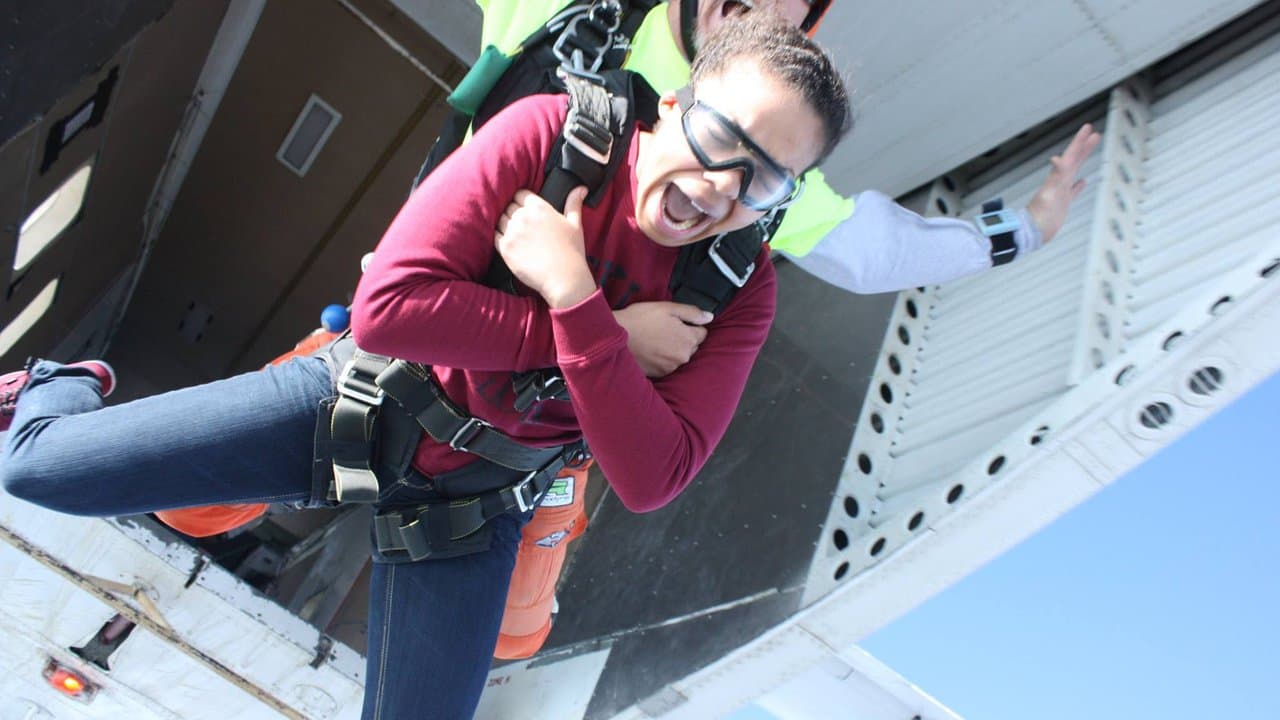 A tandem skydive exiting the jump plane at Skydive K-State