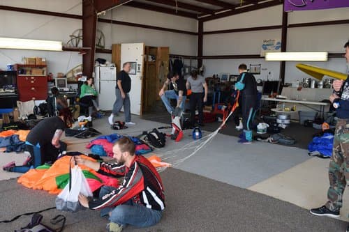 The carpeted parachute packing area at Skydive K-State